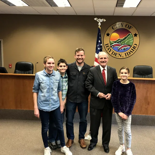 Josh Cypher and his kids with U.S. Senator Jim Risch of Idaho