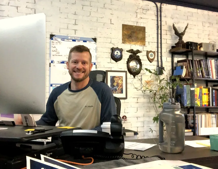 Josh Cypher at his desk in Coeur d'Alene, Idaho