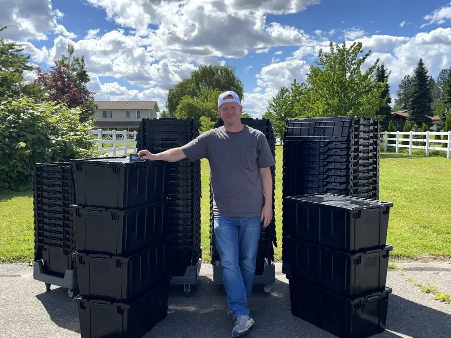 Josh Cypher with Tote Movers rental totes in Coeur d'Alene