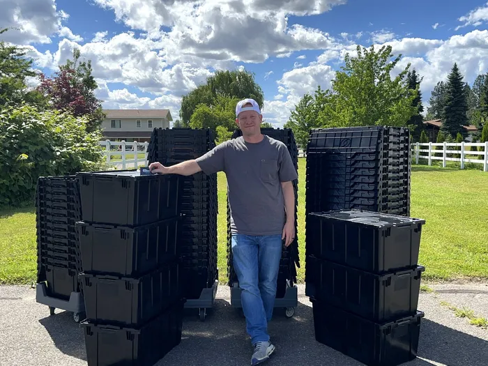 Josh with the Tote Movers fleet